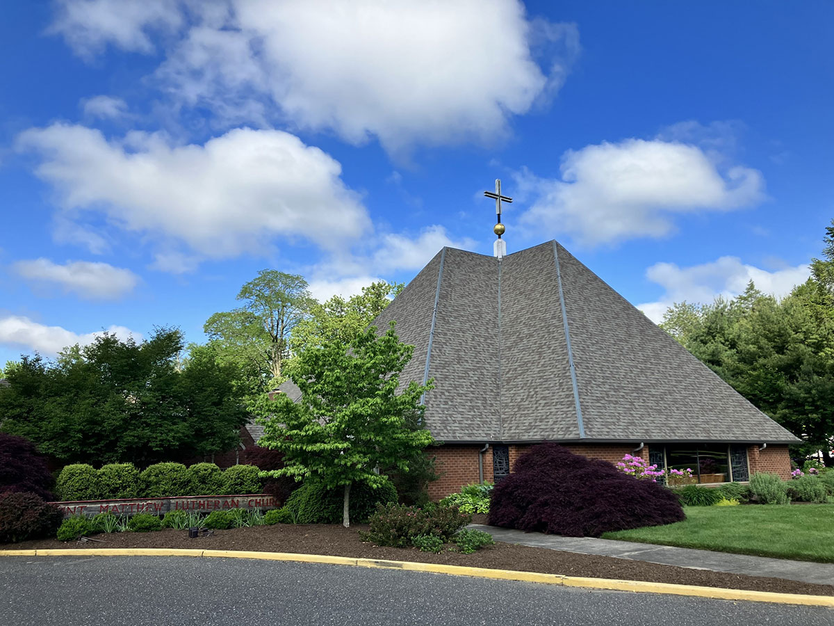 Saint Matthew Lutheran Church exterior with garden landscaping