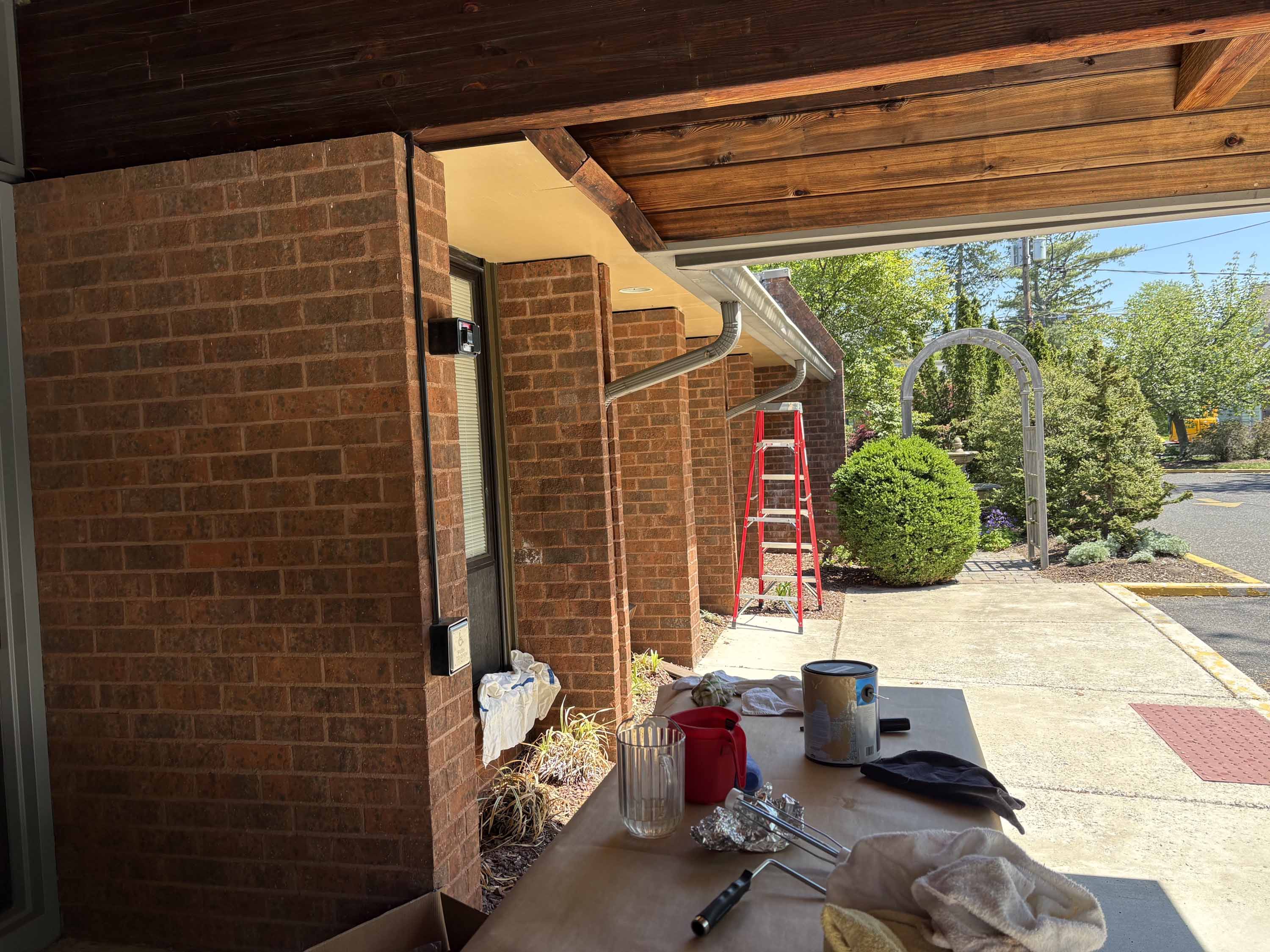 Property team painting the soffits